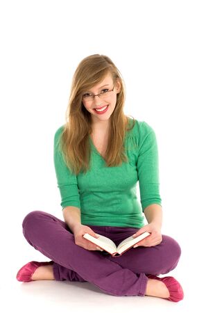 Girl reading bookの写真素材