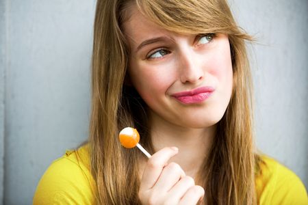Cute Girl with Lollipopの写真素材