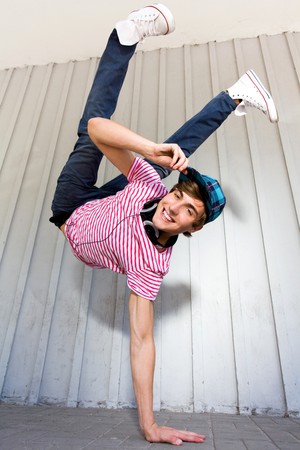 Man Balancing on One Handの写真素材