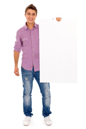 Young man holding blank posterの写真素材