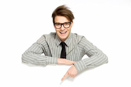 Young businessman with blank posterの写真素材