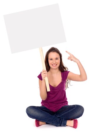 Attractive woman holding blank posterの写真素材