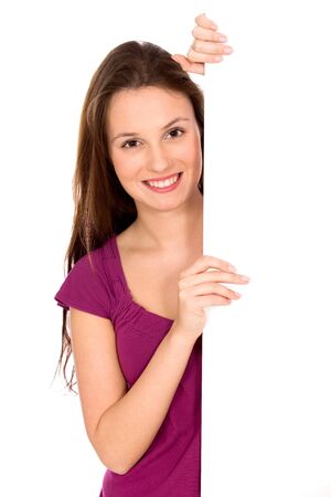 Attractive woman holding blank posterの写真素材