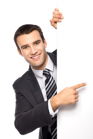 Businessman holding blank poster Businessman holding blank poster