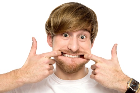 Man stretching his mouth