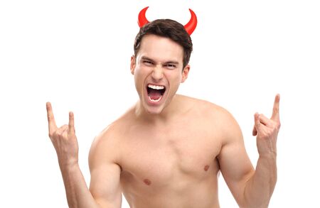 Man wearing devil horns