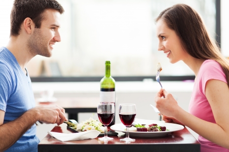 Couple having meal in restaurant Couple having meal in restaurant