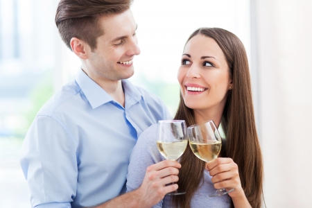 Young couple toastingの写真素材