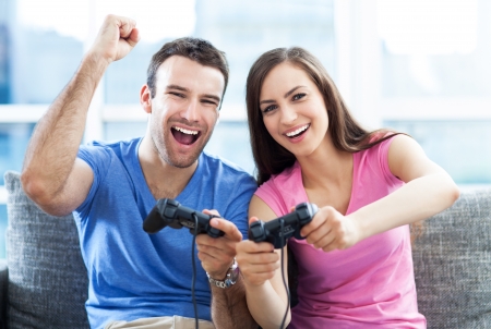 Couple playing video gamesの写真素材