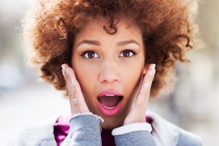 Amazed young woman