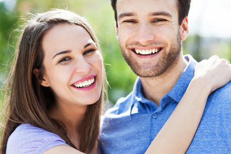 Young couple huggingの写真素材
