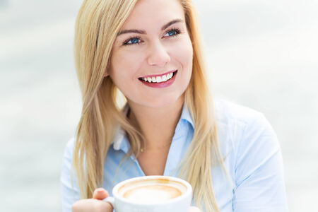 Woman drinking coffeeの写真素材