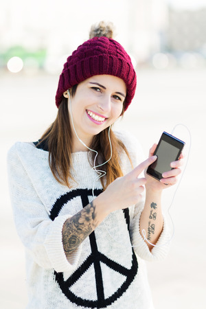 Young woman with smartphoneの写真素材