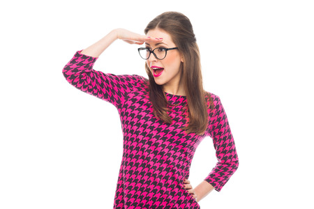 Attractive woman looking out for somethingの写真素材