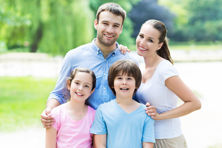 happy family outdoorsの写真素材