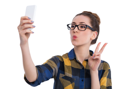 Hipster girl using smartphoneの写真素材