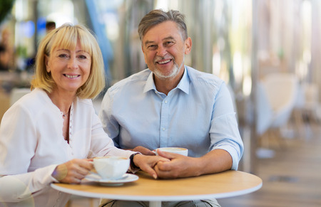 Mature couple at cafeの写真素材