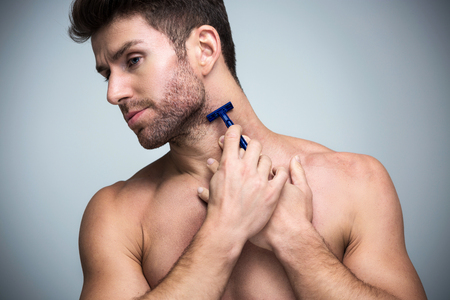 man shavingの写真素材