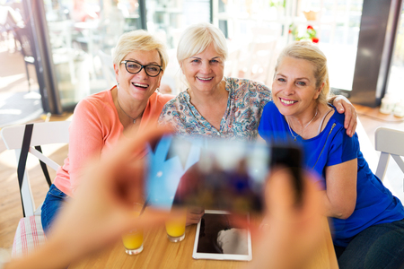 Group of senior women taking a selfieの写真素材