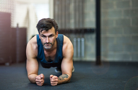 Man working out in gymの写真素材