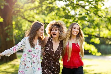 Group Of Three Female Friends Having Fun Togetherの写真素材