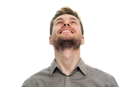 Portrait of young man looking upの写真素材