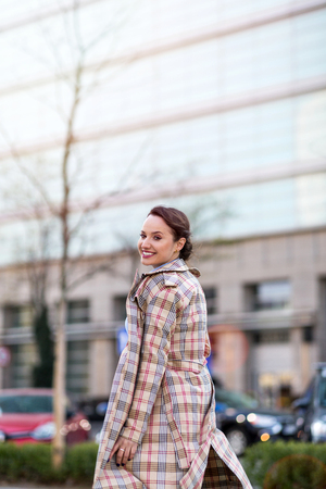 Portrait of a young woman in the cityの写真素材