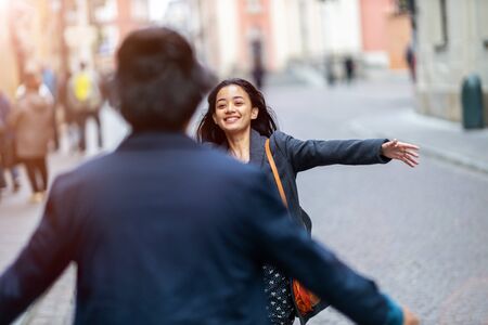 Happy young couple, walking through the old city, Warsaw, Polandの写真素材