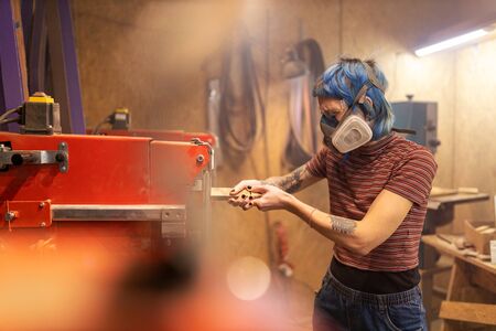 Female Carpenter In Her Workshopの写真素材