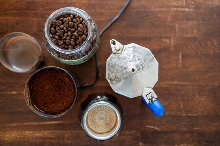 Above view of coffee supplies on wooden tableの写真素材