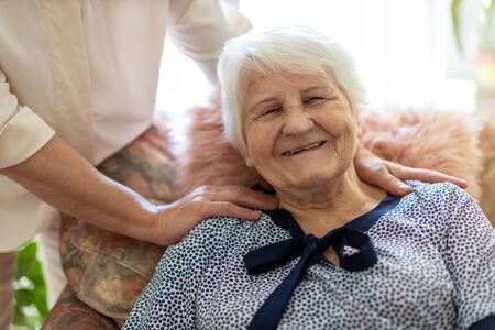 Woman spending time with her elderly motherの写真素材