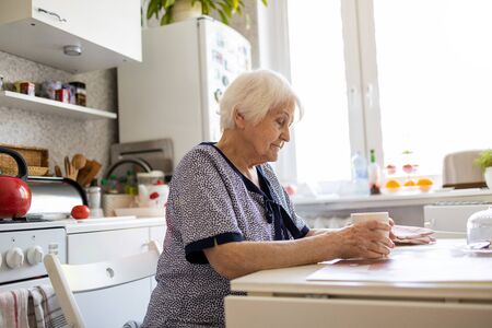 Elderly woman looking sad