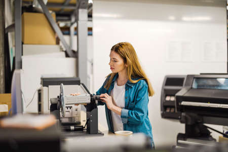 Young woman working in an industrial place of work
