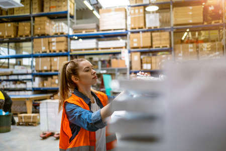Young woman working in an industrial place of work