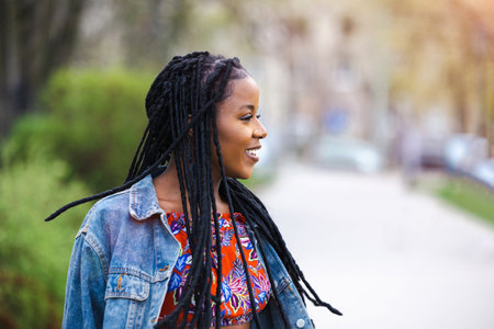 Portrait of a beautiful young woman in the cityの写真素材