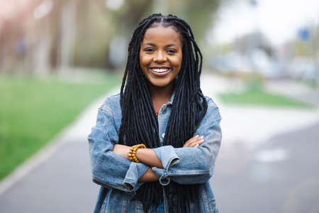 Portrait of a beautiful young woman in the cityの写真素材