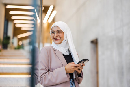Portrait of a confident muslim businesswoman in an office buildingの写真素材