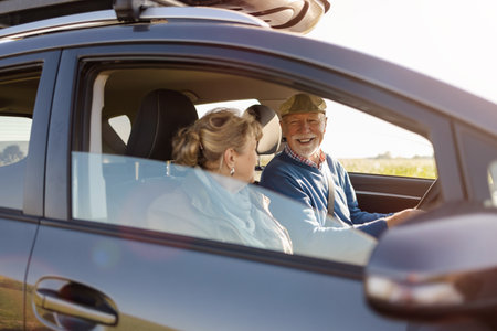 Senior couple driving a carの写真素材