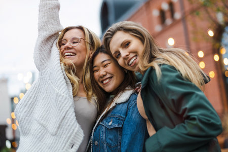 Group of female friends having fun in the city