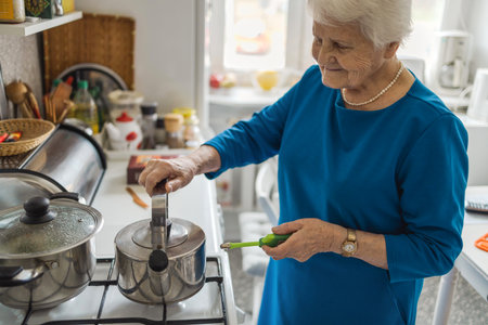 Portrait of an elderly woman in her homeの写真素材