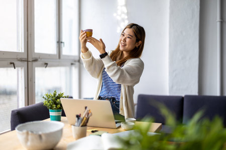 Young asian businesswoman working in the officeの写真素材