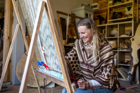 Portrait of a woman embroidery artist in her studio.の写真素材
