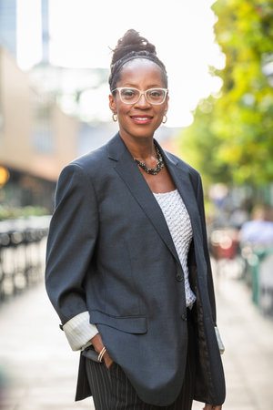 Portrait of a beautiful African American businesswoman in the cityの写真素材
