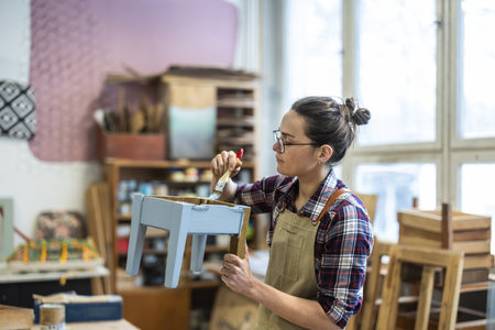 Portrait of female carpenter in workshopの写真素材