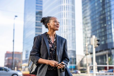Portrait of an African American businesswoman in the cityの写真素材