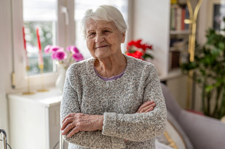 Portrait of senior woman with arms crossed.の写真素材