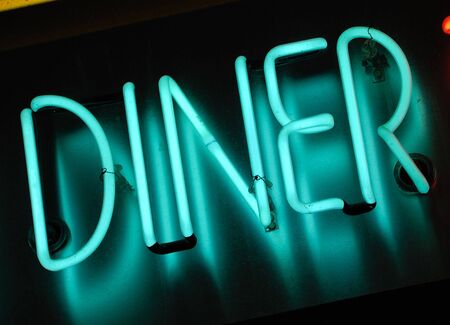 illuminated blue neon sign at night - dinerの写真素材