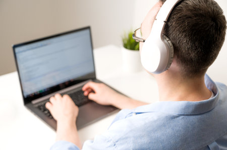 Top view on asian male working on laptop.Programing,online education,work from etc. selective focus