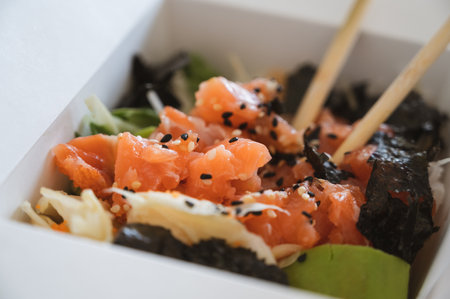 Salmon fish poke bowl box. Hawaiian,asian cuisine