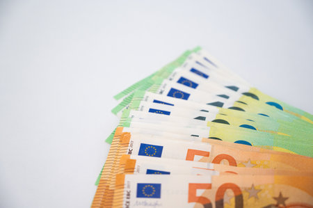 Top view on hundred and fifty euro bills. Income,loam,salary,investment,cost of living conceptsの写真素材